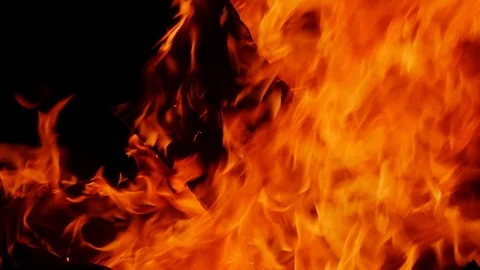 Slow motion camp fire isolated on black background Stock Footage 99033035