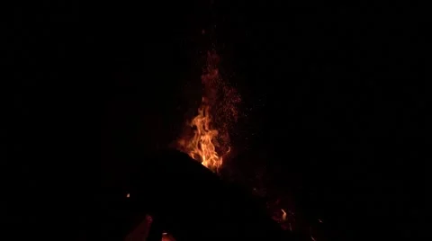 Slow Motion Camp Fire Vertical Pan Into The Darkness Of The Night Stock Footage 63235303