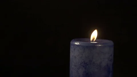 Slow Motion Candle Flickering 3 Stock Footage 77151108