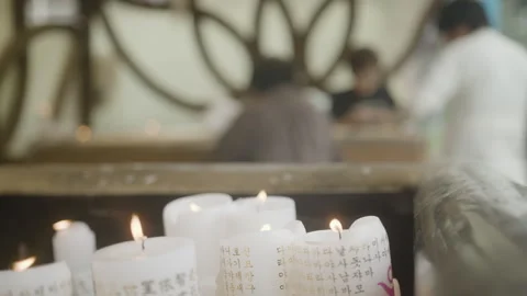 Slow-motion of Candle Offerings Burning at Jogyesa Buddhist Temple, Seoul Stock Footage 340941420