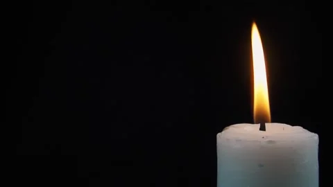 Slow motion of candles lit in the corner isolated black background Stock Footage 279039826