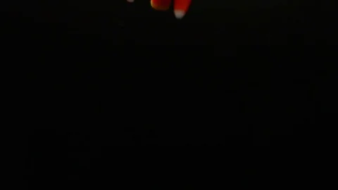 Slow Motion Candy Corn Spilling Stock Footage 70334209