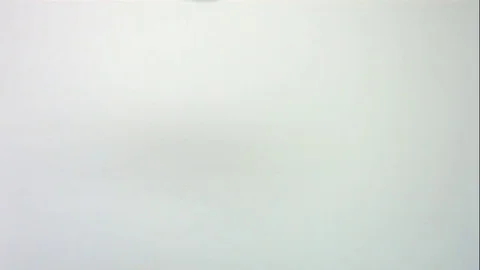 Slow Motion Candy Spilling From A Blue Egg On White Stock Footage 70333531