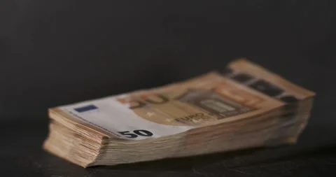 Slow motion capture of money stack movements and details Stock Footage 337229145