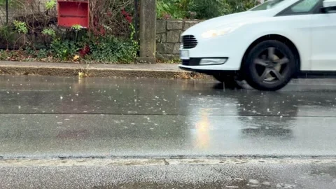 Slow Motion Car Passing On Rainy Wet Street Stock Footage 320831463
