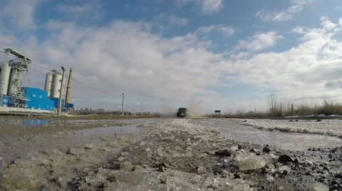 Slow motion. Car rides on the camera. Fly sprays and ice.	. 库存影片 60258443