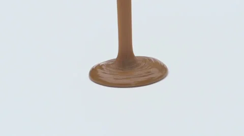 Slow motion caramel pouring Stock Footage 33801289