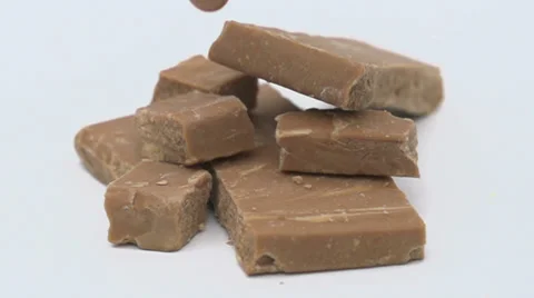 Slow motion caramel pouring Stock Footage 33801314