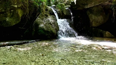 Slow motion cascades produced by the river alento abruzzo Video stock 157898939