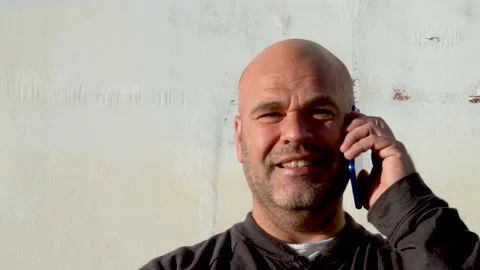 Slow motion, Caucasian man talking with the phone- Stock Footage 166794143