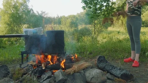 Slow motion of cauldron on camp fire in forest. Stock Footage 94263652