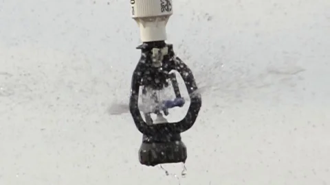 Slow Motion of a Center Pivot Irrigation Nozzle Stock Footage 72607155