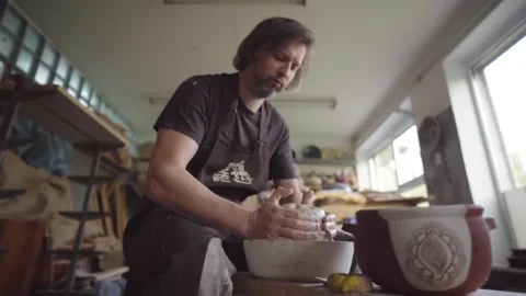 Slow motion. Ceramics studio. Potter at work 스톡 동영상 143377030
