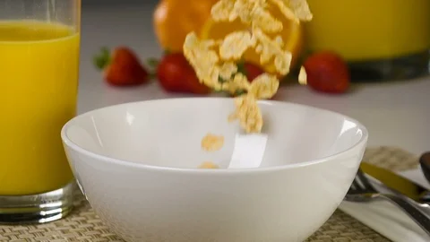 Slow Motion Cereal Being Poured Into A Bowl 스톡 동영상 85775428