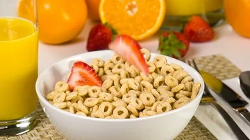 Slow Motion Cereal Being Poured Into A Bowl Video stock 85775478