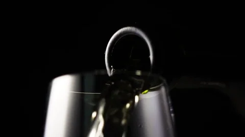 Slow motion champagne being poured into glass Stock Footage 72561392