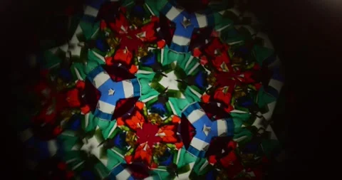 Slow Motion of Changing Patterns in Handmade Kaleidoscope Creating Unique Stock-Footage 330956119