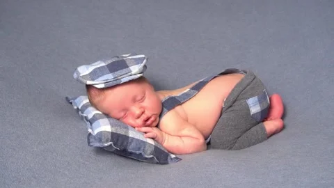 Slow Motion Charming newborn sleeping on tiny pillow Video stock 153760178