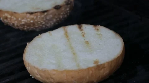 Slow motion of Chef Cooking in the Kitchen, Restaurant wok fire cooking Close up Vídeo Stock 142880776