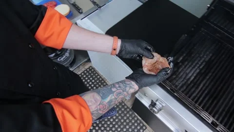 Slow motion of Chef Cooking in the Kitchen, Restaurant wok fire cooking Close up Stock Footage 142886056