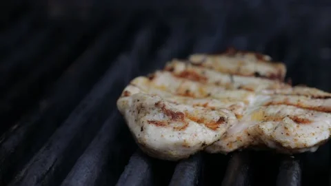Slow motion of Chef Cooking in the Kitchen, Restaurant wok fire cooking Close up Stock Footage 142889644
