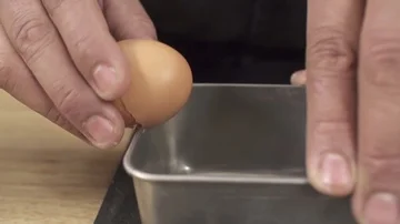 Slow motion Chef Separating the Eggs Stock Footage 85877883