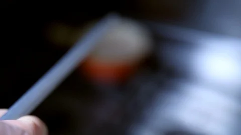 Slow motion Chef sharpening dull knife with honing steel sharpener in  kitchen Stock Footage 86536760