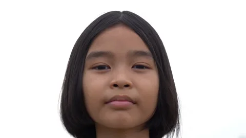 Slow motion children smiling on white sky background, happiness kids is lovely 動画素材 179697799