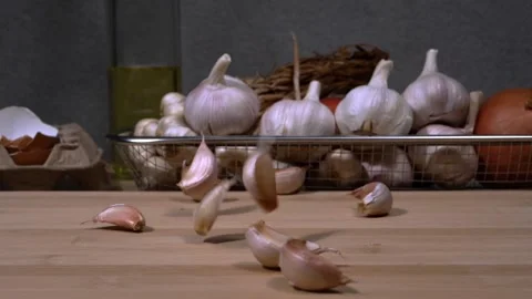 Slow motion chilli drop on wood cutting board. Food ingredients. Cooking concept Video stock 232966453