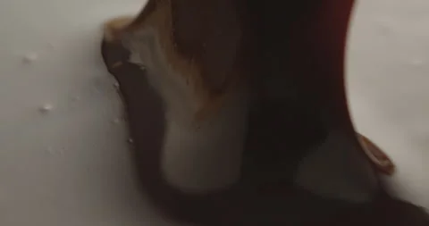 Slow Motion Chocolate Bar Falling into Liquid Chocolate - Rich Dessert Footage Stock Footage 276875269
