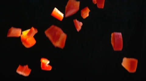 Slow Motion Chopped Red Bell Pepper falls Stock Footage 68672291