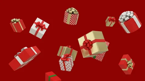 Slow motion of Christmas gift boxes floating and falling on red background. Stock Footage 137916470