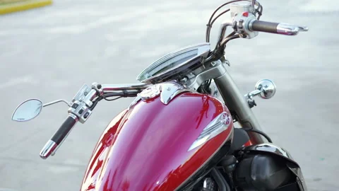 Slow motion of chrome details of a red chopper motorcycle Видео 158774429