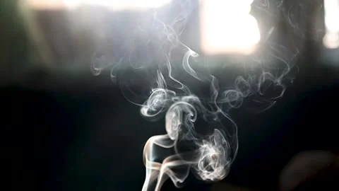 Slow motion of Cigarette smoke with black background. Wisp of cigarette Видео 233460033