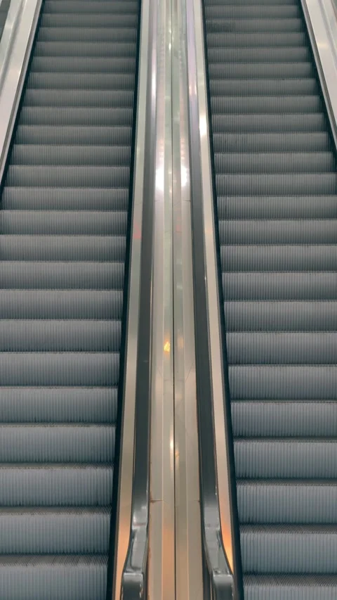 Slow motion cinematic 4K B-roll footage of escalator steps in shopping mall  Stock Footage 306238019