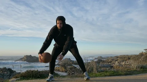 Slow motion cinematic of authentic and trendy basketball player in black nike Stock Footage 123977652