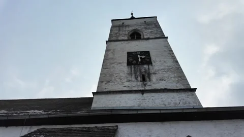 Slow Motion Cinematic Scene of St. George's Bell Tower in Pürgg, Austrian Alps 스톡 동영상 328694877