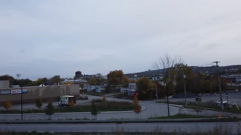Slow motion cinematic view of Downtown from Highway 15 during a cloudy day Stock Footage 123785123