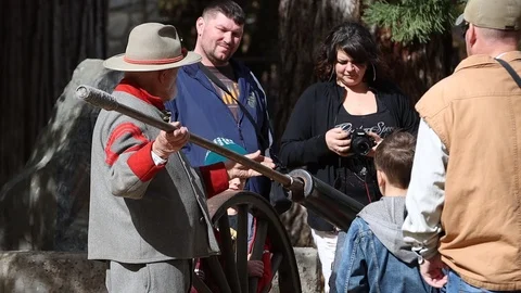 Slow Motion of Civil War Reenactor Priming Canon with Shallow Depth of Field Stock Footage 118351892