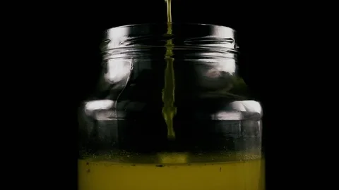 Slow motion, Clear clear broth in a jar Stock Footage 75229882