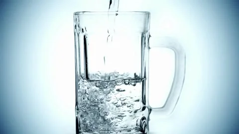 Slow motion. Clear fresh drinking water filling glass. Quenching thirst conce Stock Footage 265846062