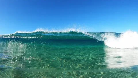 Slow Motion Clear Ocean Wave Breaking in Shallow Water Stock Footage 326096266