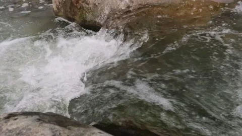 Slow motion of clear rocky mountain river water flow Stock-Footage 320921497