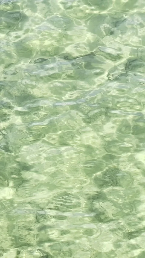 Slow Motion Clear Shallow Water Ripples 4K vertical video Video stock 333475048