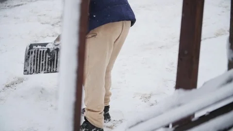 Slow Motion Clearing Snow And Shoveling Stock Footage 85104033