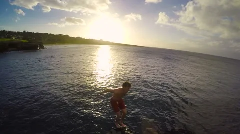 Slow Motion Cliff Jumping Backflip. Athletic Young Man Jumping From Cliff Int Stock Footage 57223829