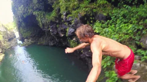 Slow Motion Cliff Jumping. Stock Footage 58260203