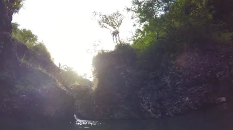 Slow Motion Cliff Jumping. Stock Footage 58260604