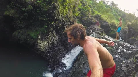 Slow Motion Cliff Jumping. Stock Footage 58260720
