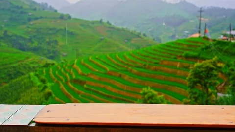 Slow motion clip. Focus Rain falls on a wooden table Stock Footage 113039602